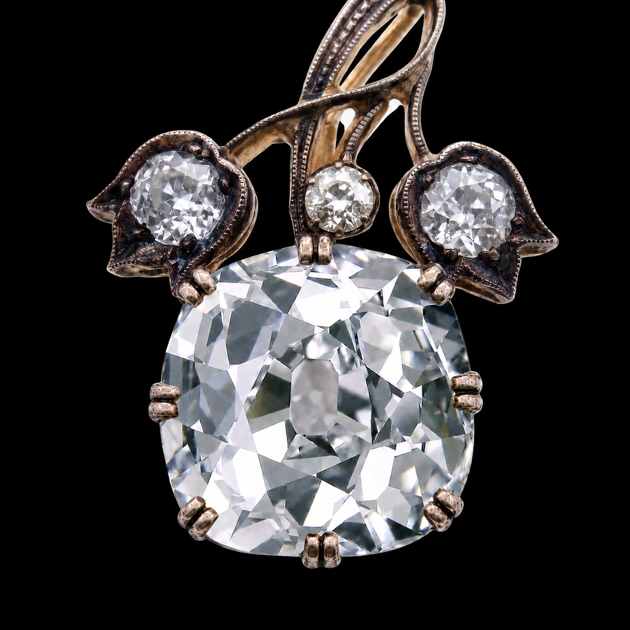 Antique cushion diamond pendant with floral old-cut diamond details