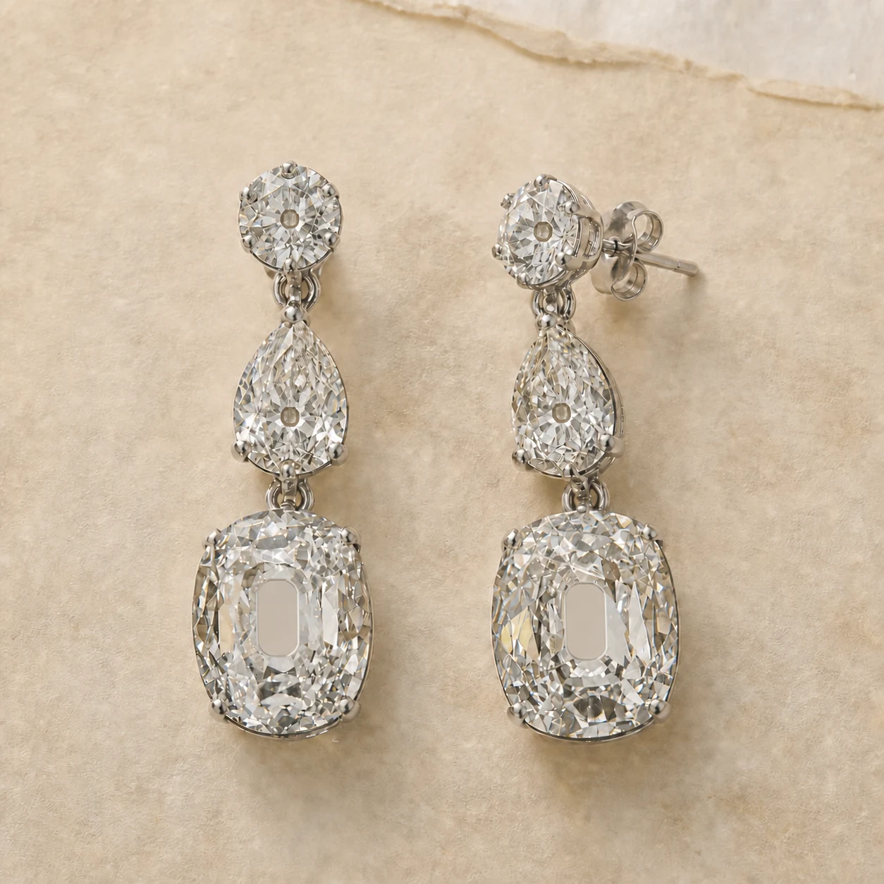 Jewelry selected for Two Three-Carat Old Mine Cushions: A Side-by-Side Comparison