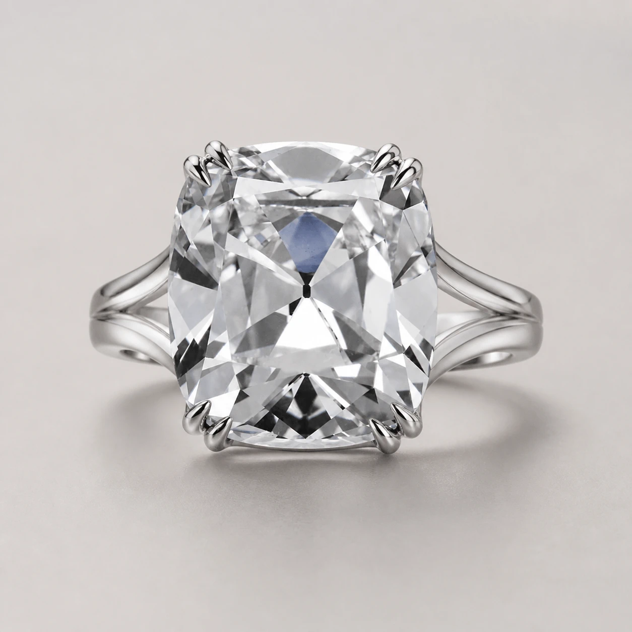 Platinum solitaire ring set with a 16 Ct. I SI1 Cushion Brilliant diamond