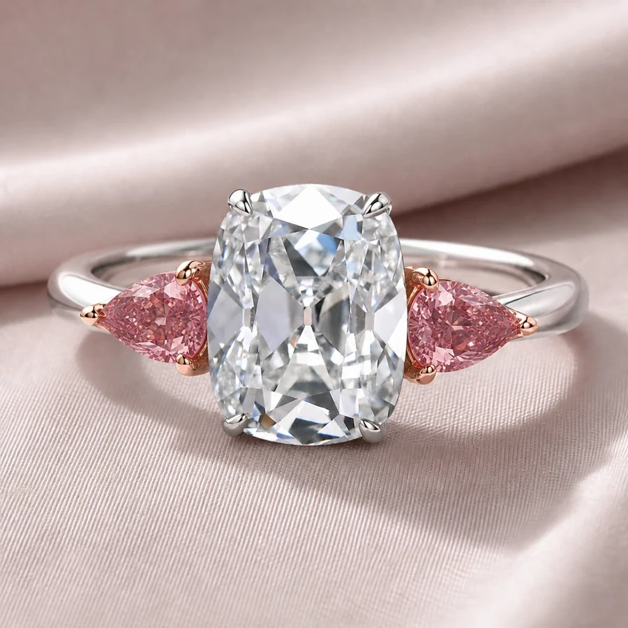 5 ct Old Mine cushion three-stone ring